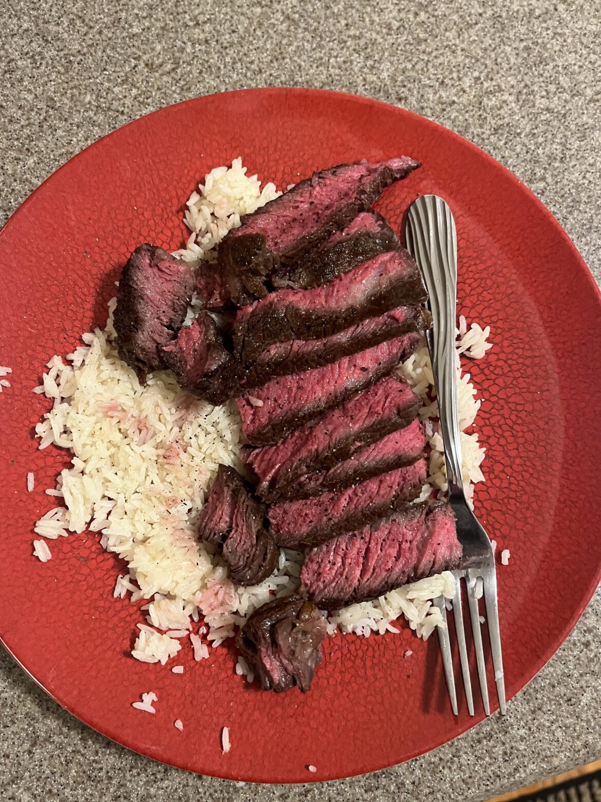 Expensive ribeye and cheap rice