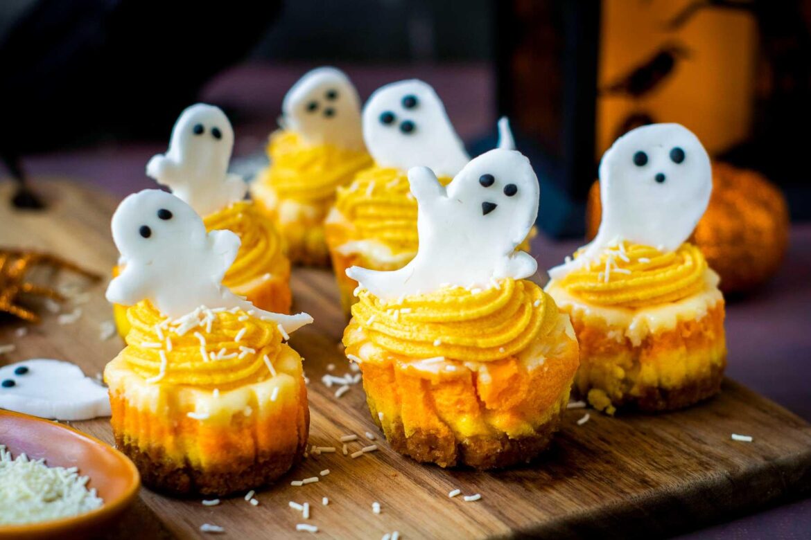 Halloween Candy Corn Mini Cheesecakes with Spooky Ghost Toppers