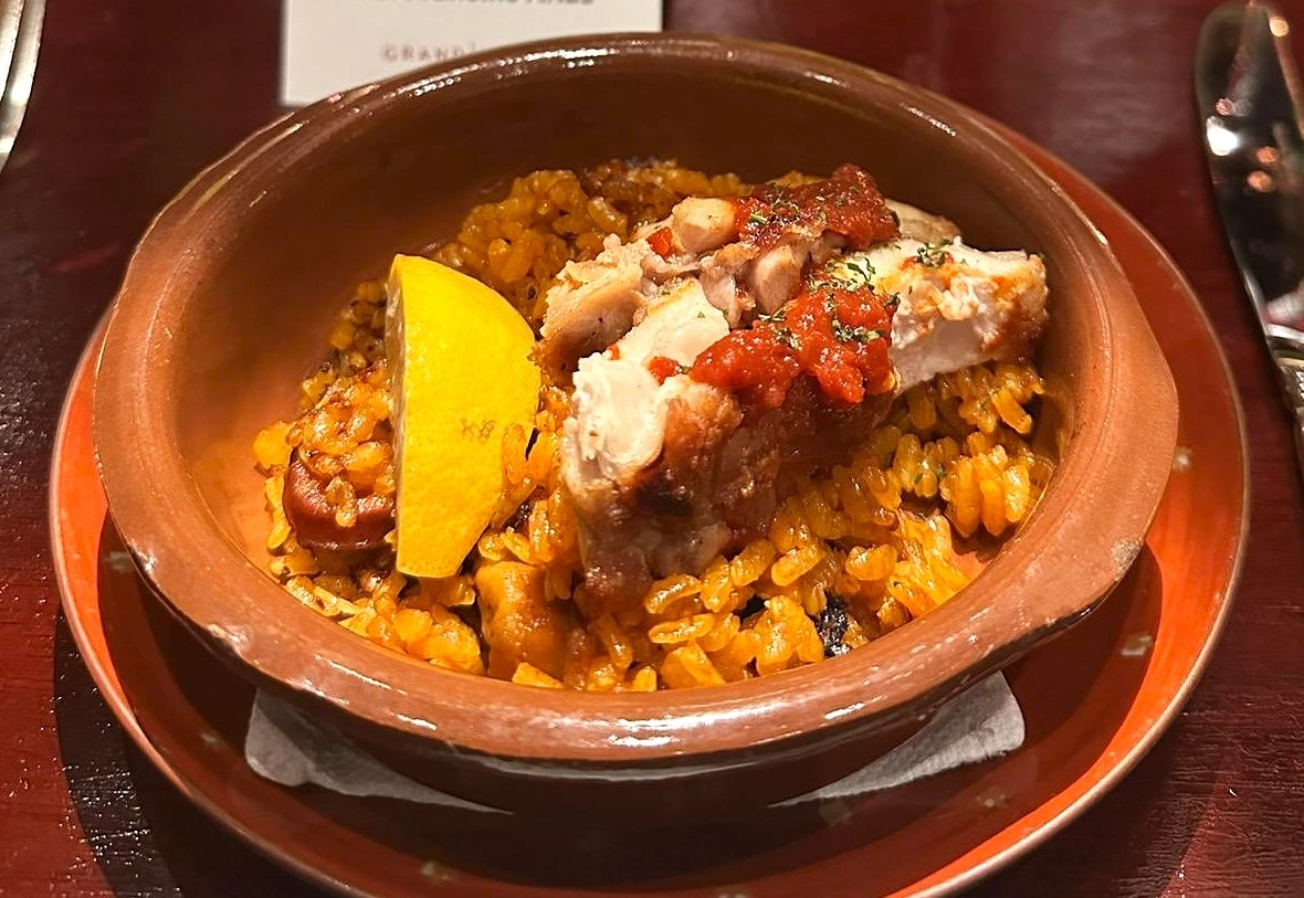 Caesar and Jamon Iberico Croquette; An assortment of pintxos: Boquerones, Grass-Fed Rib Eye, Pork Belly and Goat Cheese with Figs Compote; and Chicken and Chorizo Paella