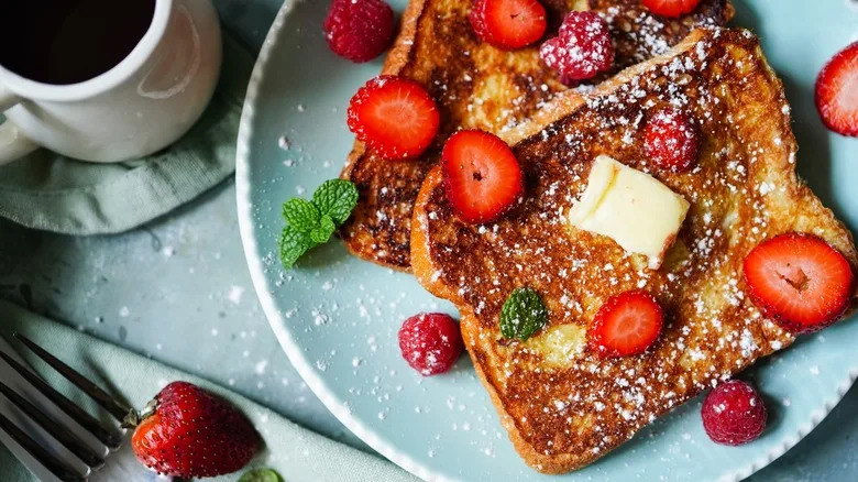 French toast on a plate with strawberries