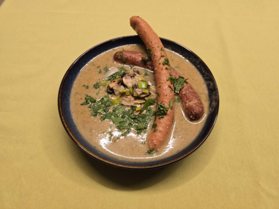 Mushroom and Pear Soup with Sausages and some Parsley