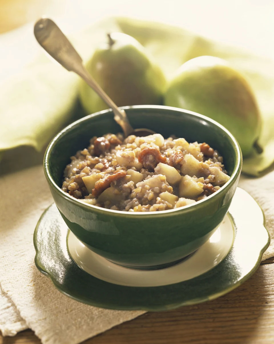 Top your porridge with pears, walnuts and ginger for a warming seasonal treat. (Getty Images)