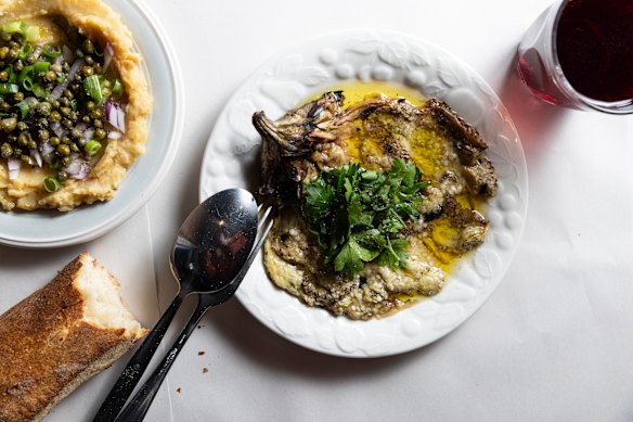Fava with caramelised onion and capers (left) and coal-roasted eggplant.