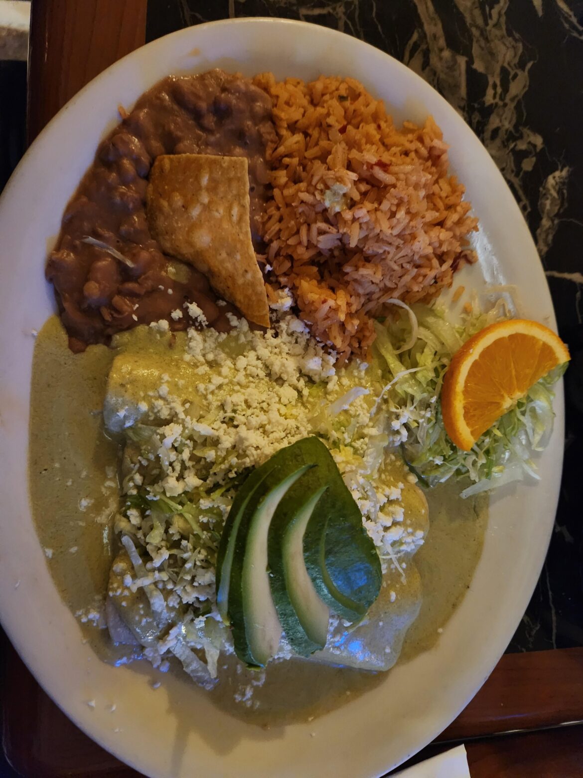 Enchiladas verdes cremosas