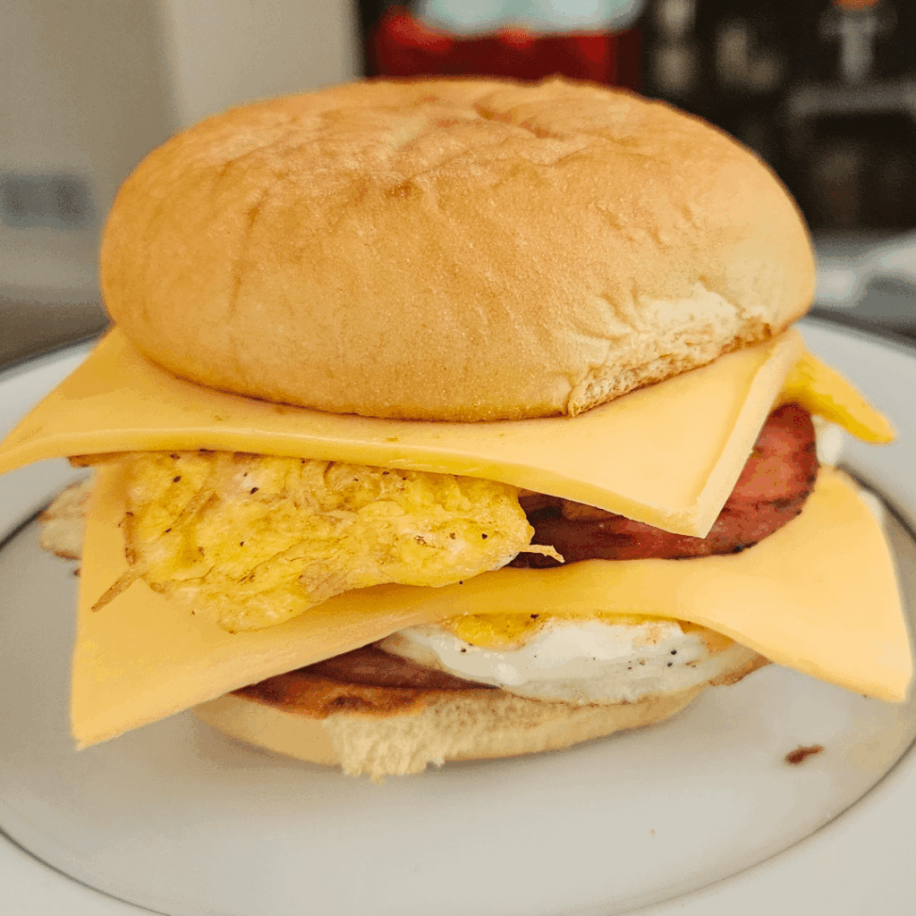 The Big Deuce - 2x egg, 2x Canadian bacon, and 2x cheese, with red sauce on a toasted keto burger bun