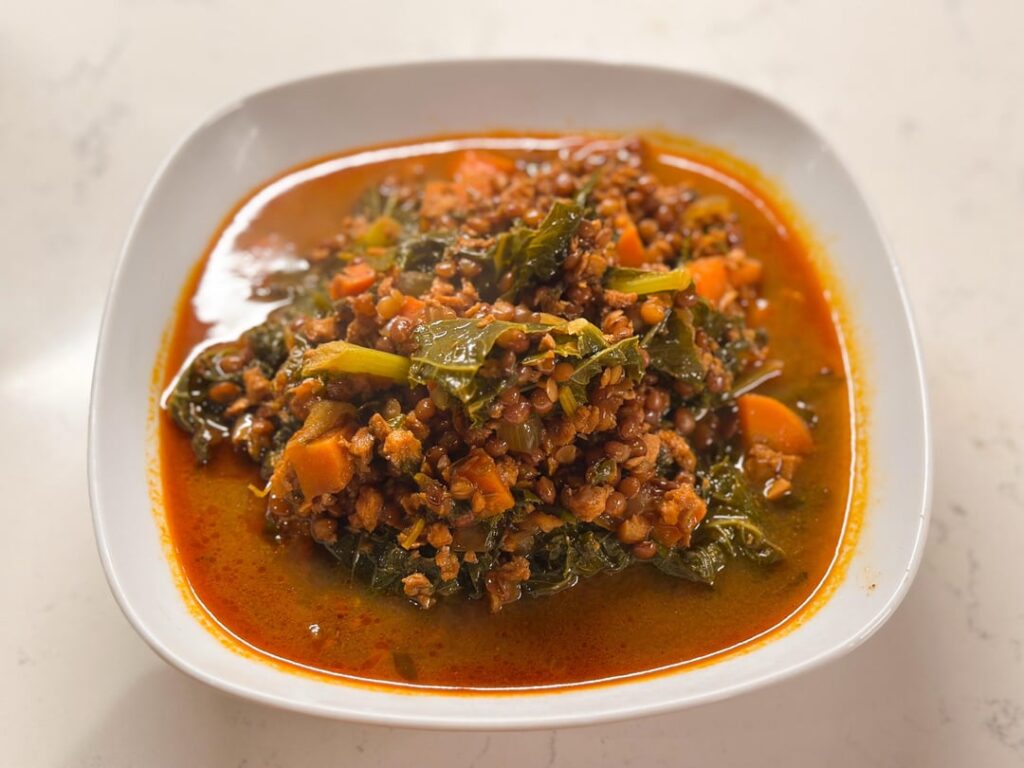 Hearty Spanish-Style Lentil and (Vegan) Chorizo Soup with Kale by David Pazmiño from Cook’s Illustrated