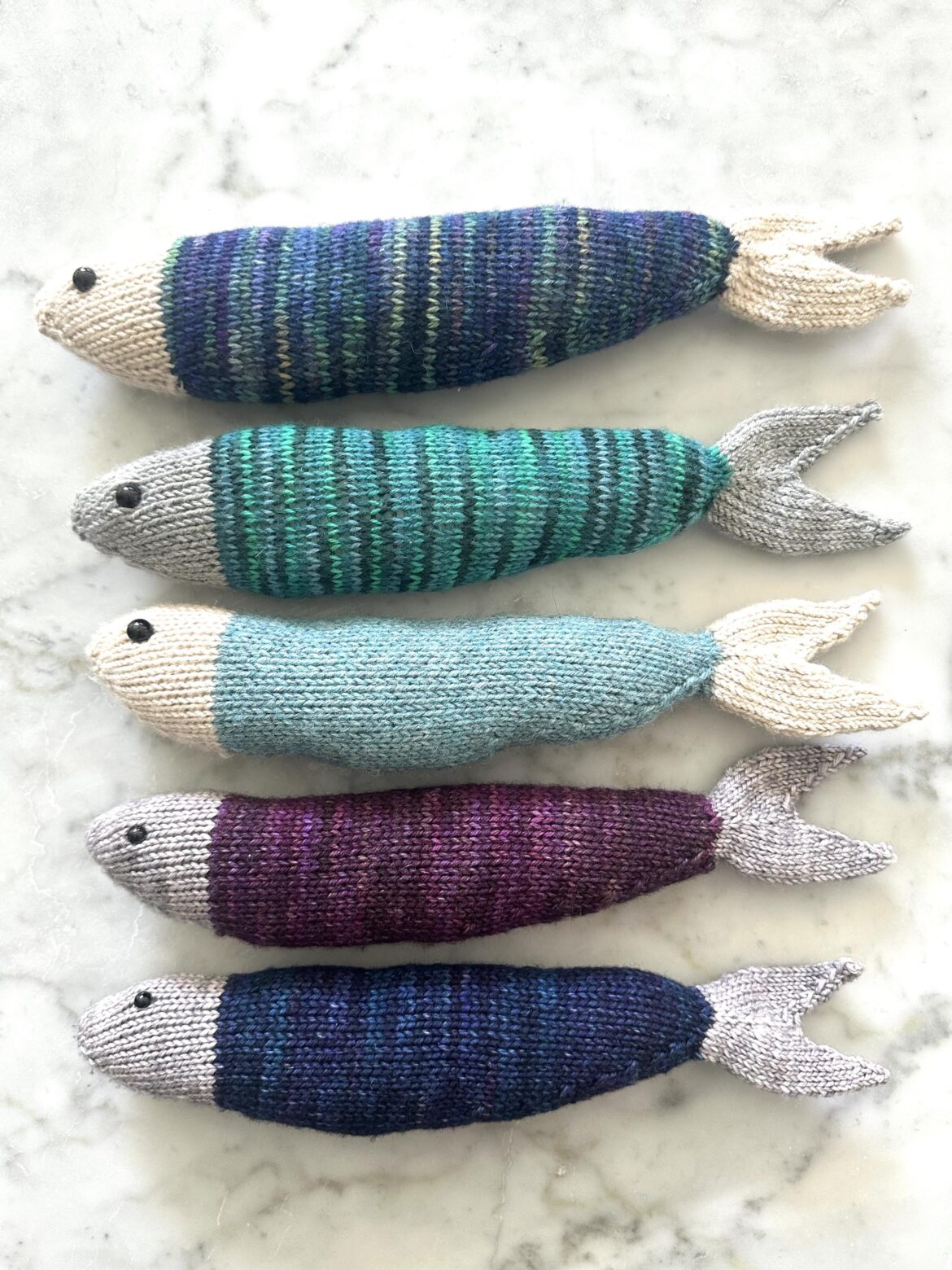 Emotional support sardines - I was recommended to post these here. Not 100% sure if it’s ok. I knitted a pile of sardines.