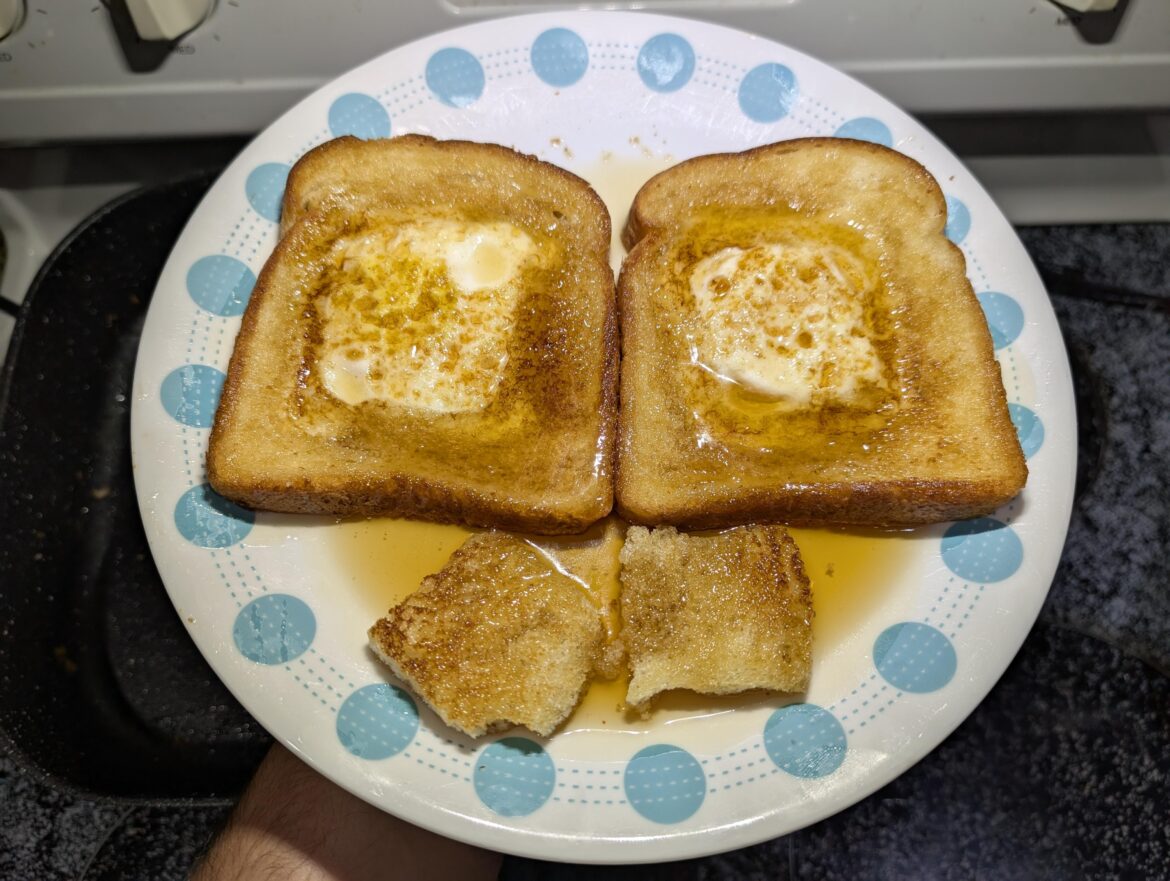 Road in the hole, for breakfast: egg in the middle of some buttered toast.