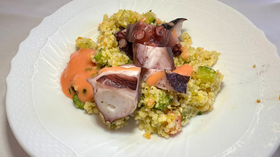 Steamed octopus and couscous on ITA Airways