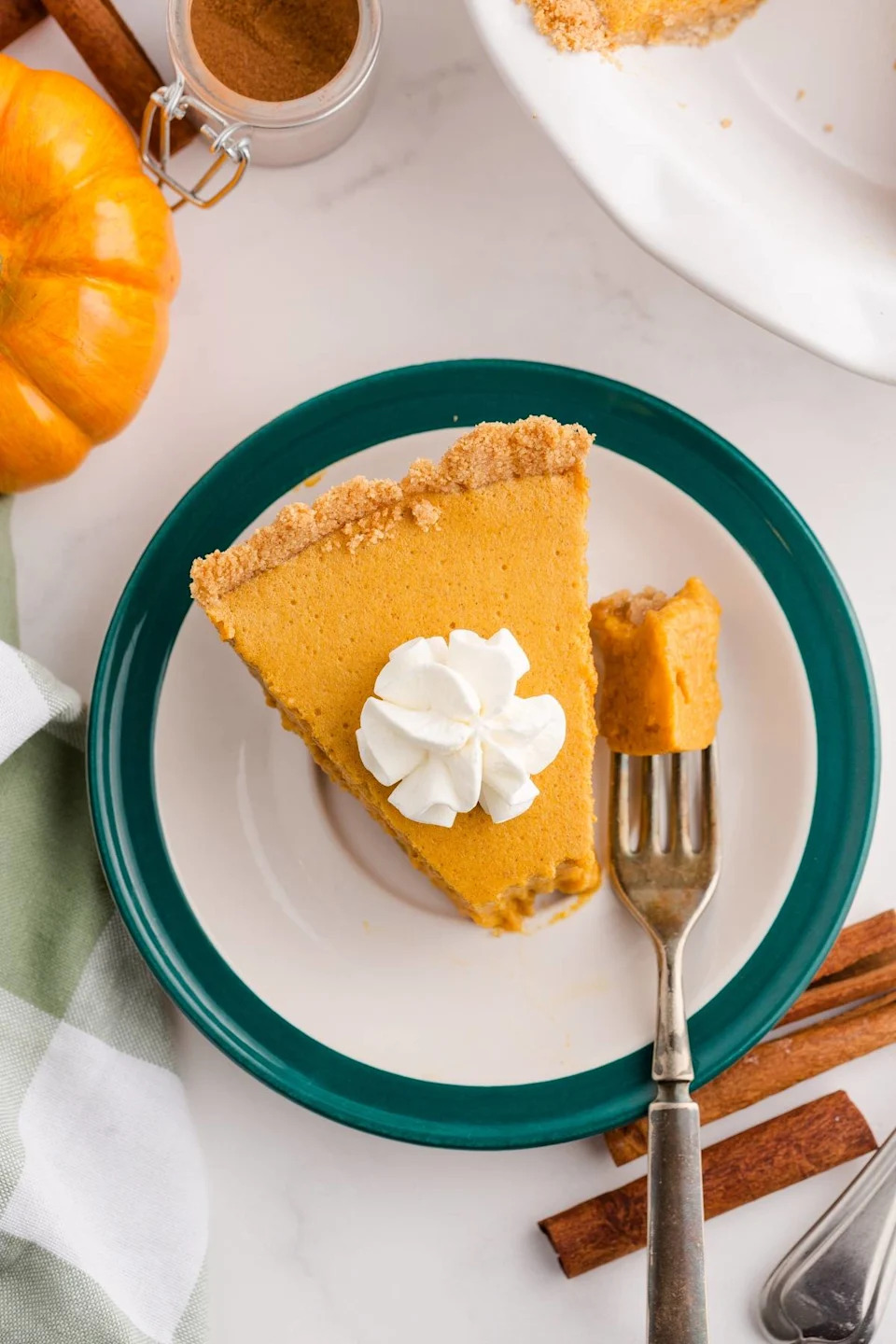 Pumpkin chiffon pie on a plate.