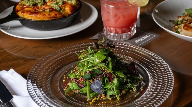 Salad on a decorative glass plate