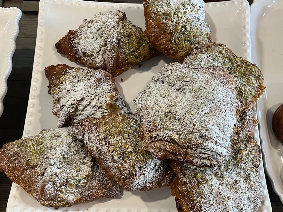 The platter of pistachio croissants at Le Cafe Gourmet's new outpost on Victory Drive