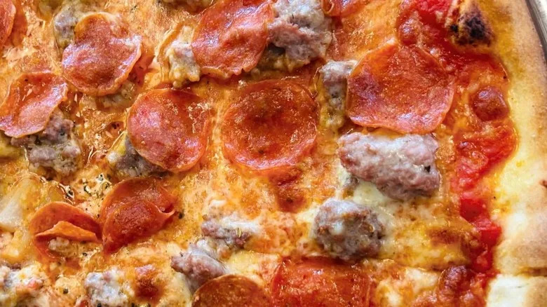 A pepperoni and sausage pizza from Louie & Ernie's in the Bronx, NYC