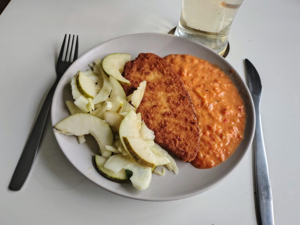 Soy schnitzel with red pepper sauce and pear-fennel salad