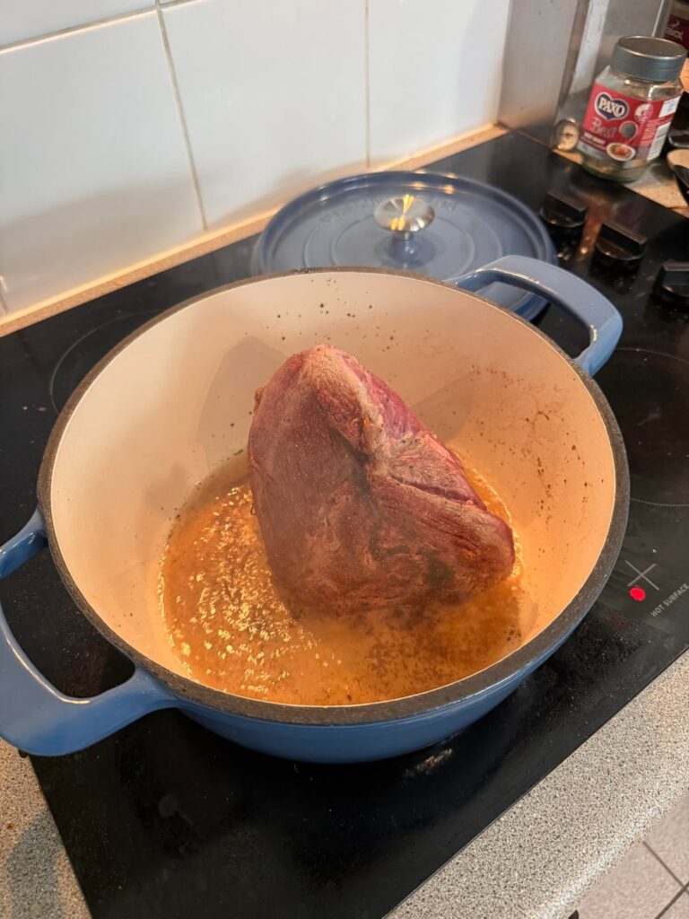 Beef pot roast, with a Australian port and rosemary sauce; fluffy red potatoes (skins on) with salted French butter (breaking in my first Dutch oven)