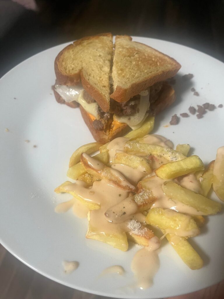 Patty melt with queso ranch seasoned fries 494 calories .