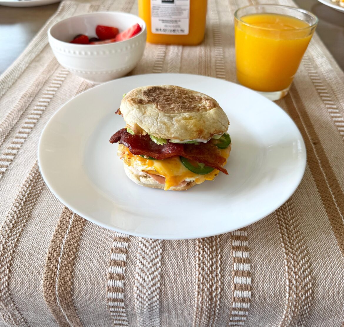 Bacon, egg, cheese, ham, jalapeño, avocado breakfast sandwich