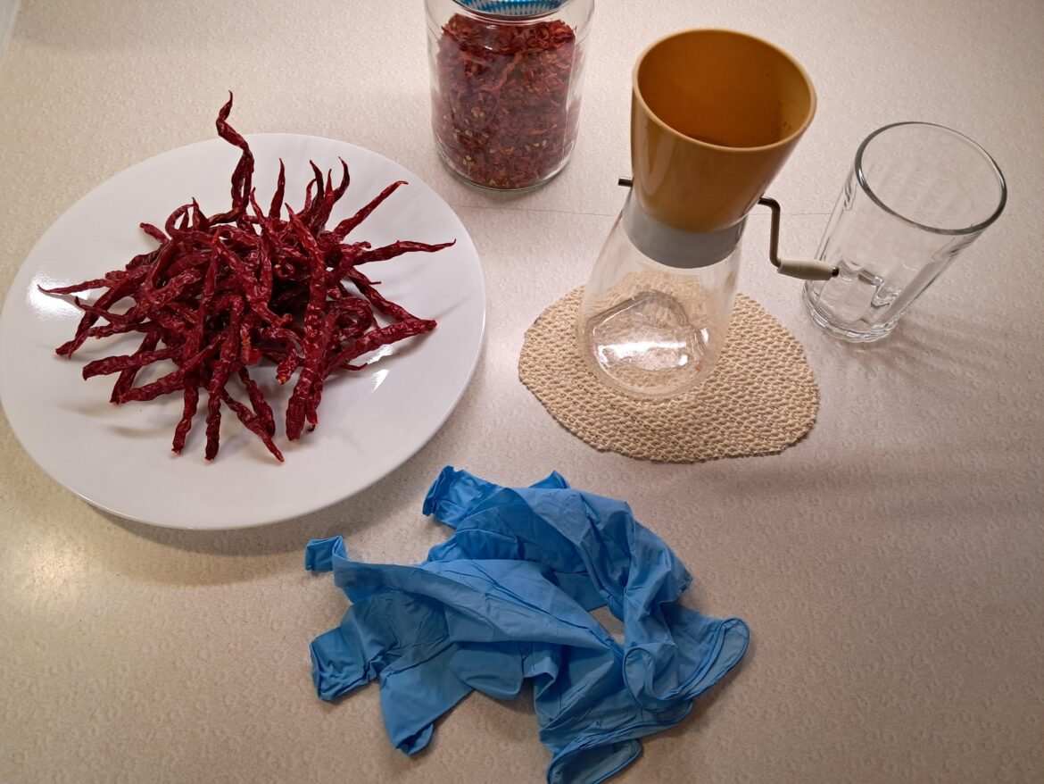 Crushing some of my cayenne today with a nut grinder