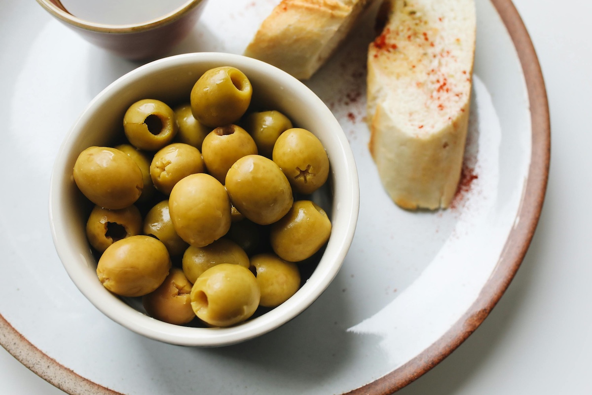 Bread and olives on a plate
