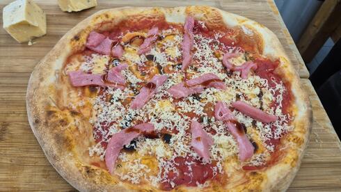 Forget pepperoni, this pizza comes with caviar and Macall Forget pepperoni, this pizza comes with caviar and Macall