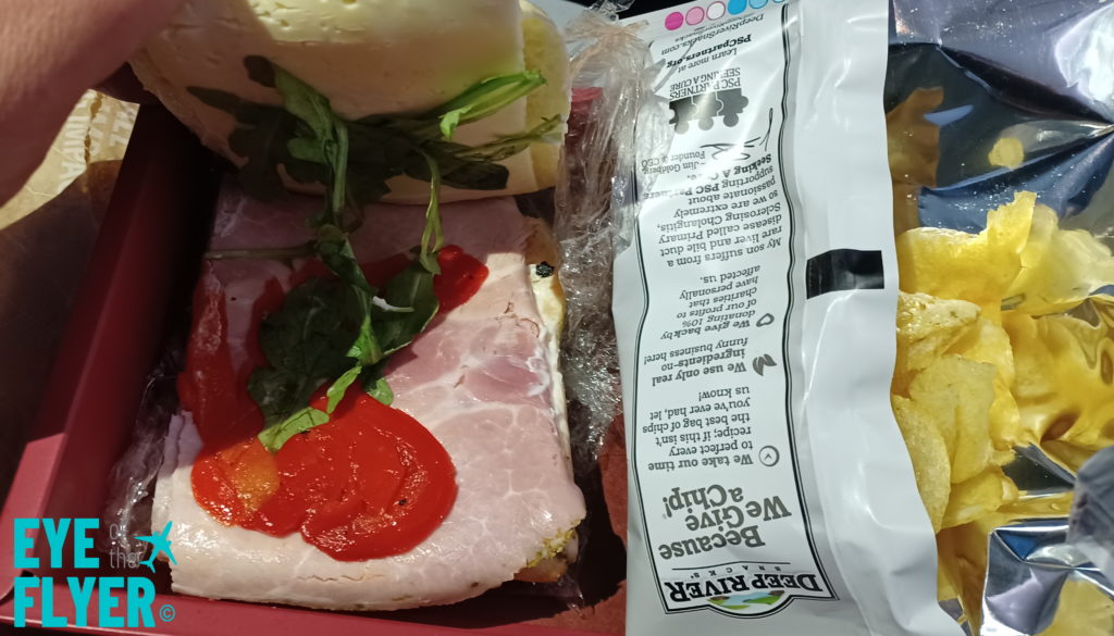 a sandwich with ketchup and cheese