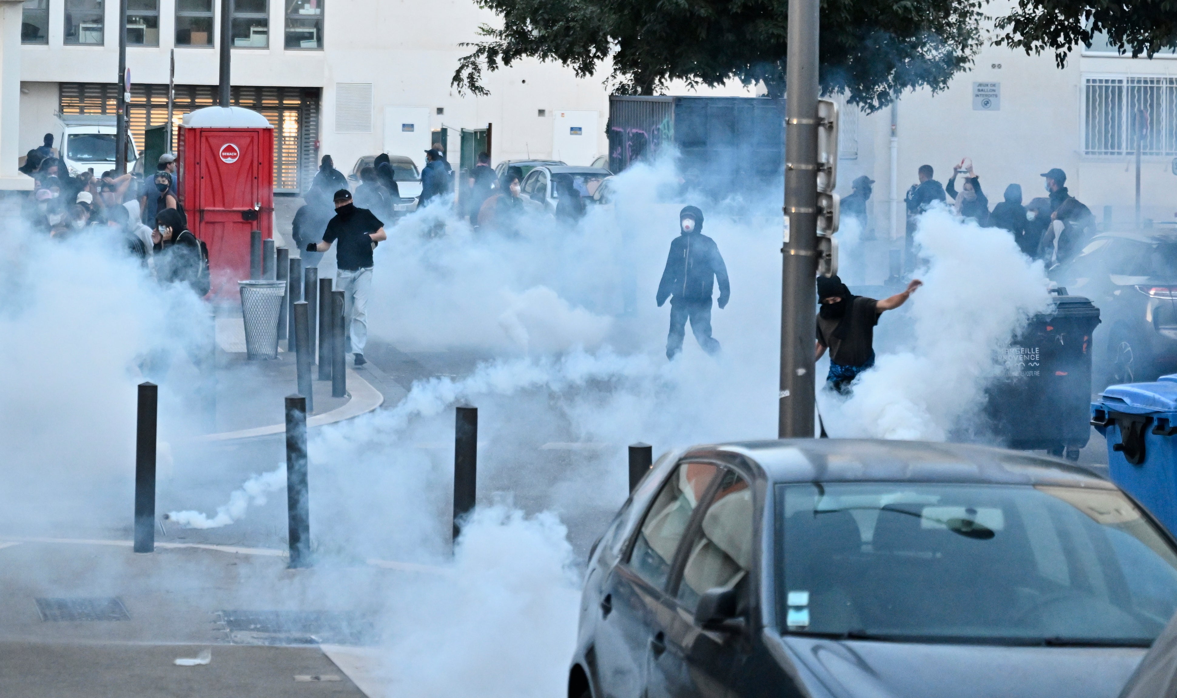 French police fire teargas grenades during a protest in Marseille, in the south of France, on Wednesday
