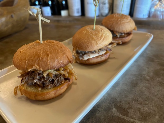 Carnitas sliders with guac and salsa at Luna Bistro &...