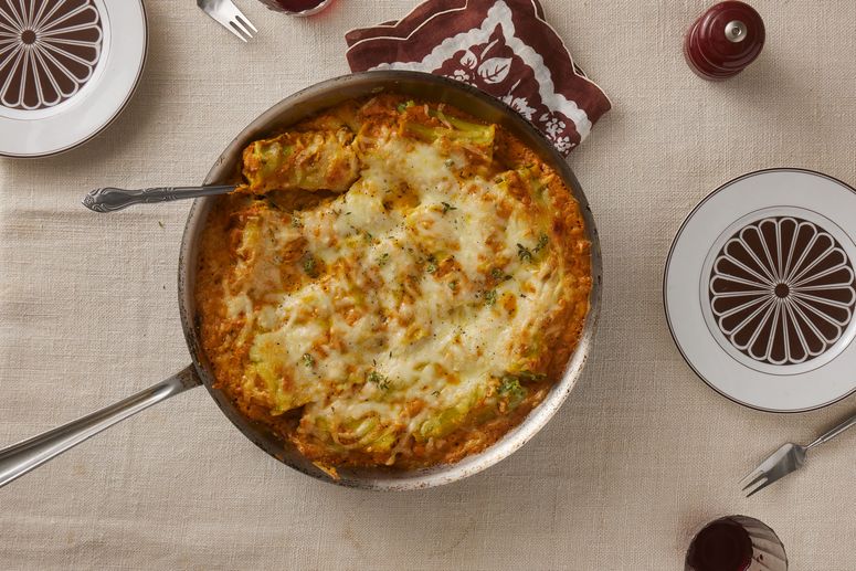 Pumpkinspinach lasagna rollups in a skillet