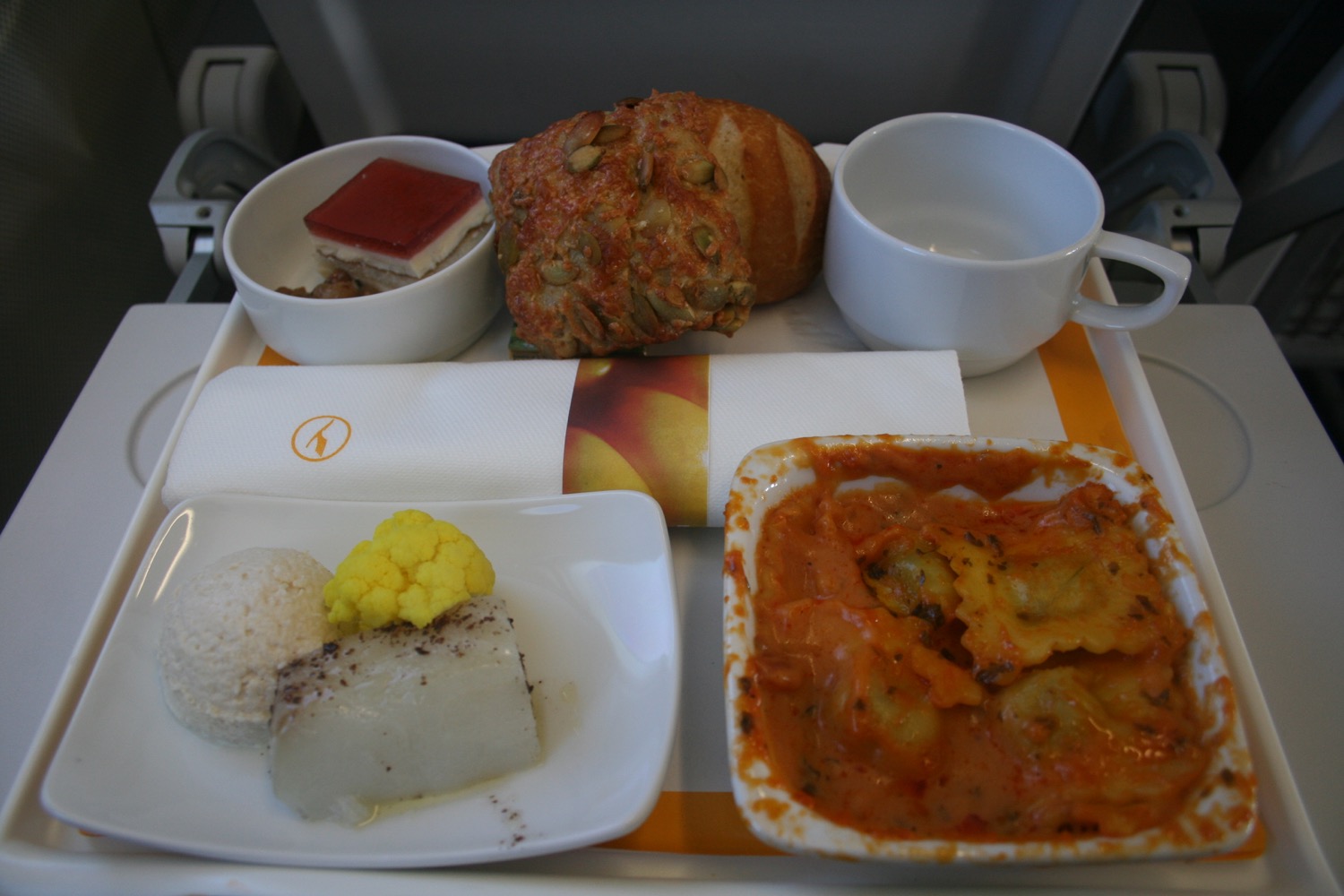 food on a tray on a plane