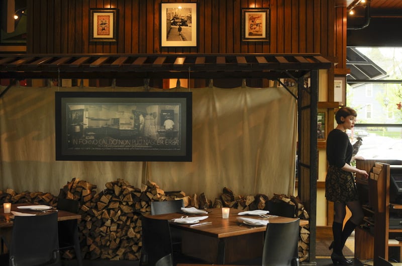 Nostrana's dining room and host stand in 2014. The restaurant, which turns 20 years old this month, remains one of Portland's busiest.