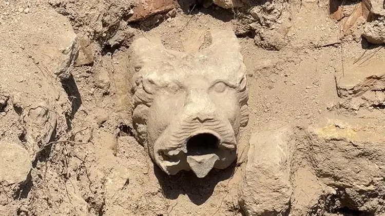 The lion-head spout is the visual and functional heart of this workshop complex. Credit: DHA