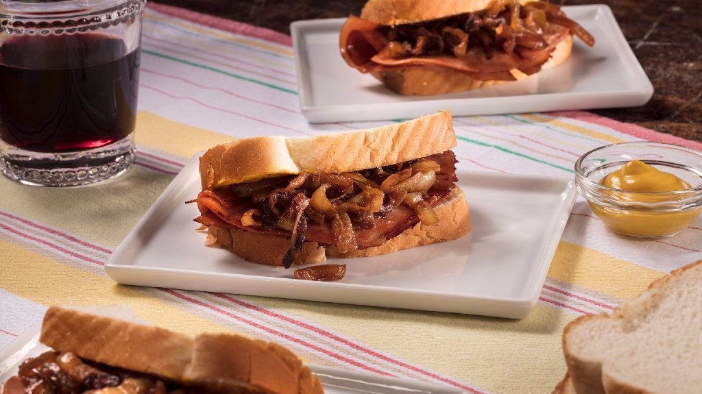 Fried bologna sandwich from Don Nielsen's family features caramelized onions and the condiment of your choice. Fried bologna sandwich from Don Nielsen's family features caramelized onions and the condiment of your choice.