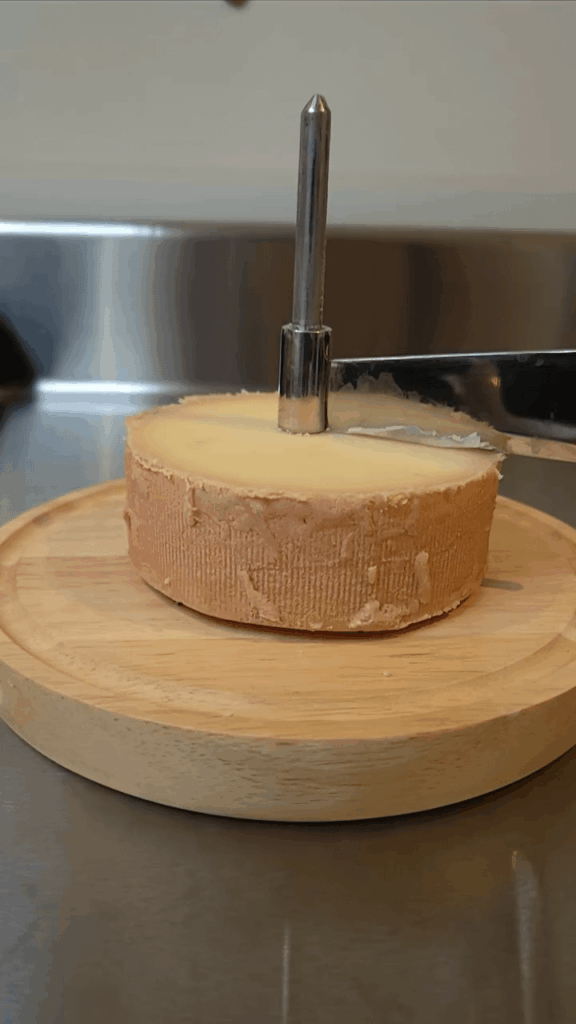 Tete de Moine cheese shaving on a Girolle
