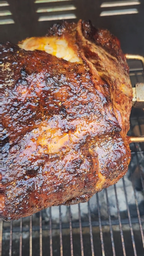 charcoal rotisserie pork butts.