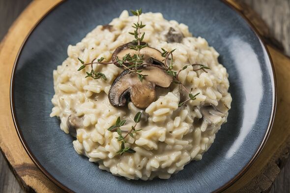 A photo of a plate of creamy mushroom risotto A photo of a plate of creamy mushroom risotto