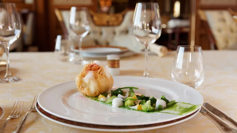 creative fish entree at expensive french restaurant