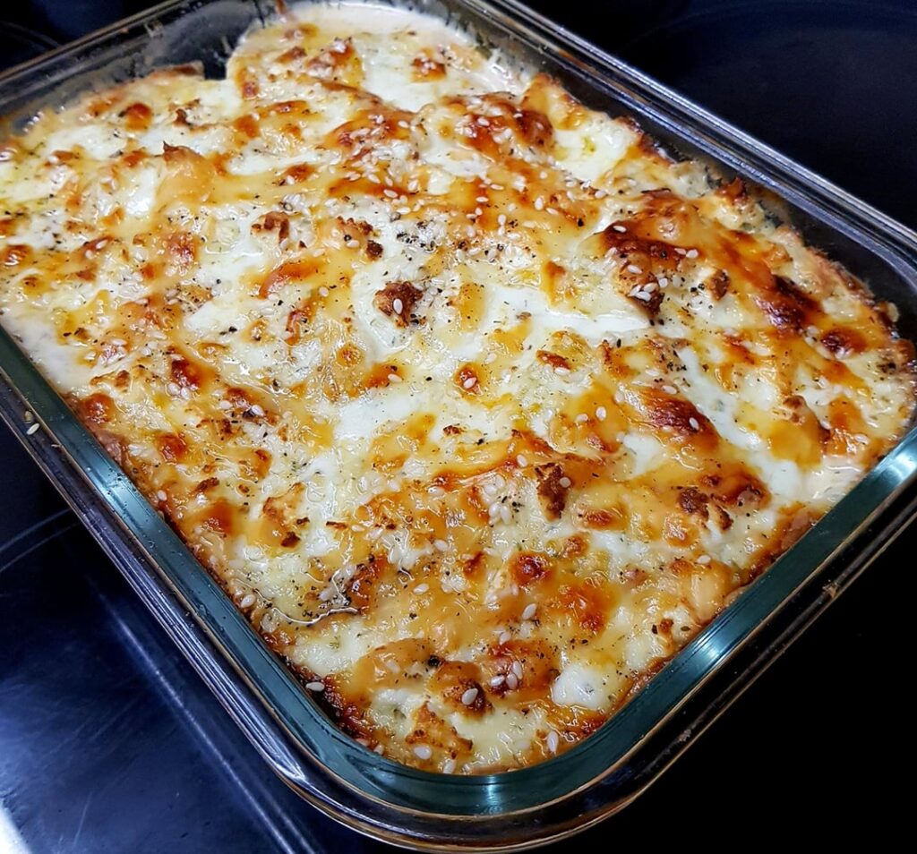 A Spin on a Greek Boureki (Layered Potato/Courgette Bake), with Greek Stuffed Chicken and Salad. Note below.