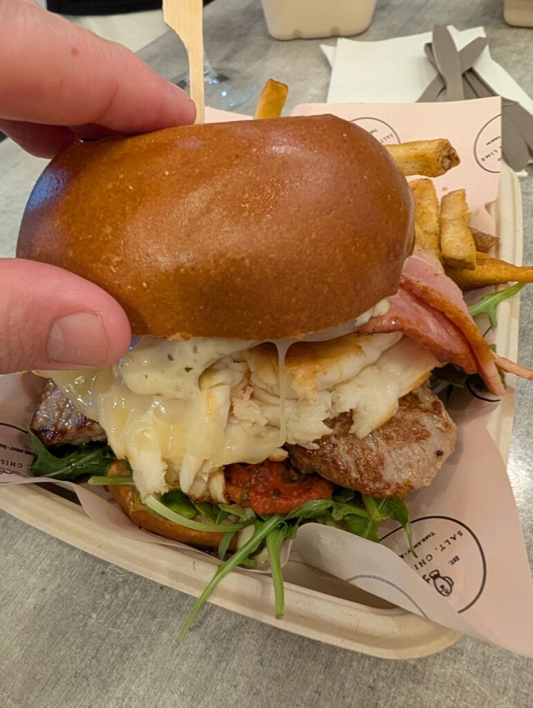 Lobster veal and bacon burger with a side of veal wrapped prawns Lobster veal and bacon burger with a side of veal wrapped prawns