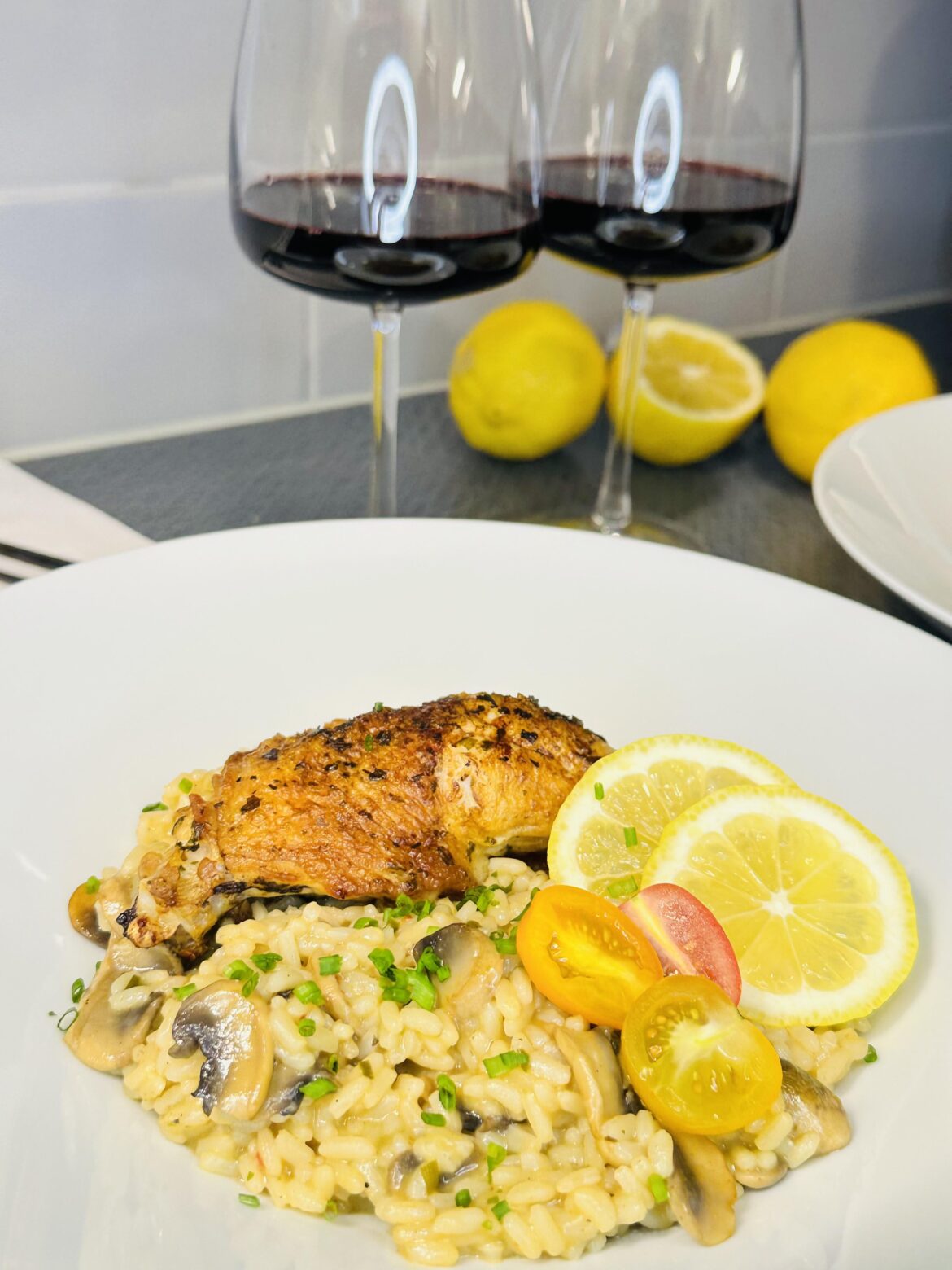 Homemade creamy mushroom risotto with crispy chicken.