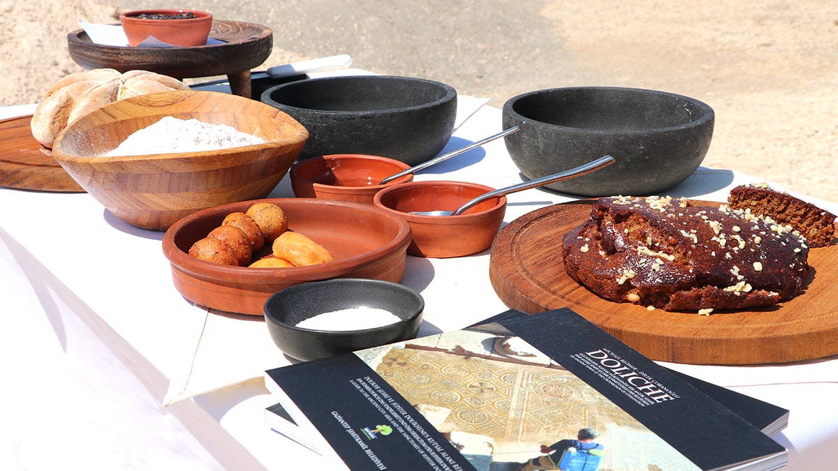 Array of ancient roman dishes on display