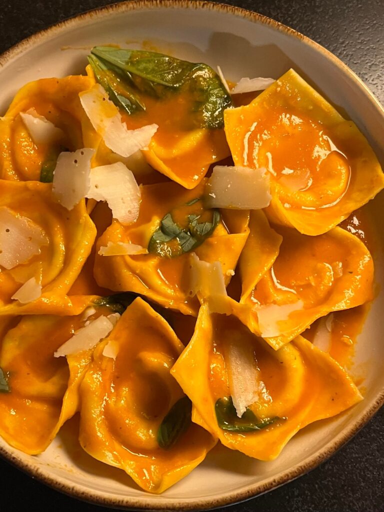 Home made tomato sauce and a filling on potatoes pecorino and mint.