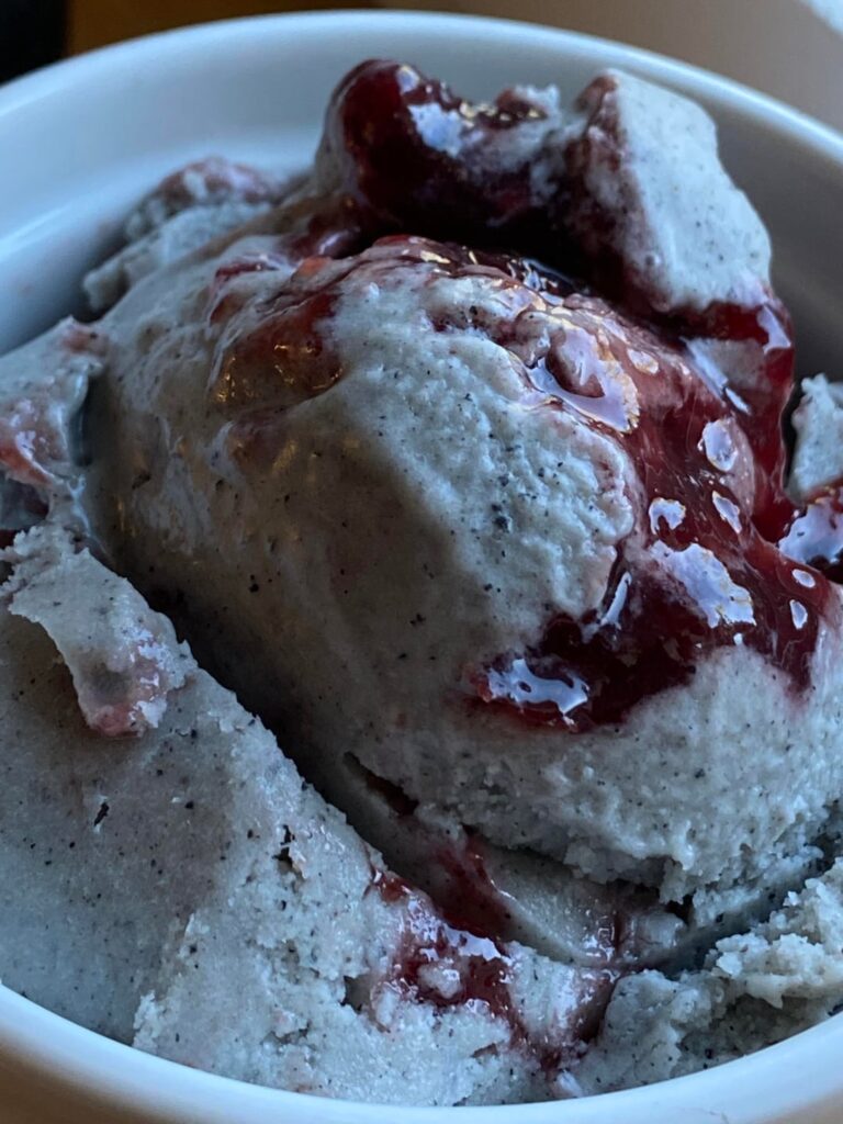 Non dairy black sesame ice cream with sour cherry jam