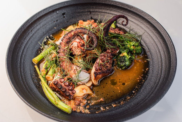 Polpo - crispy octopus, candied walnuts, and rapini. Photo by Lisa Hu Chen