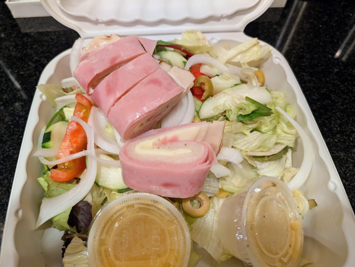 Eating a salad from an Italian Place, until it's not cut with a chainsaw. Day 1