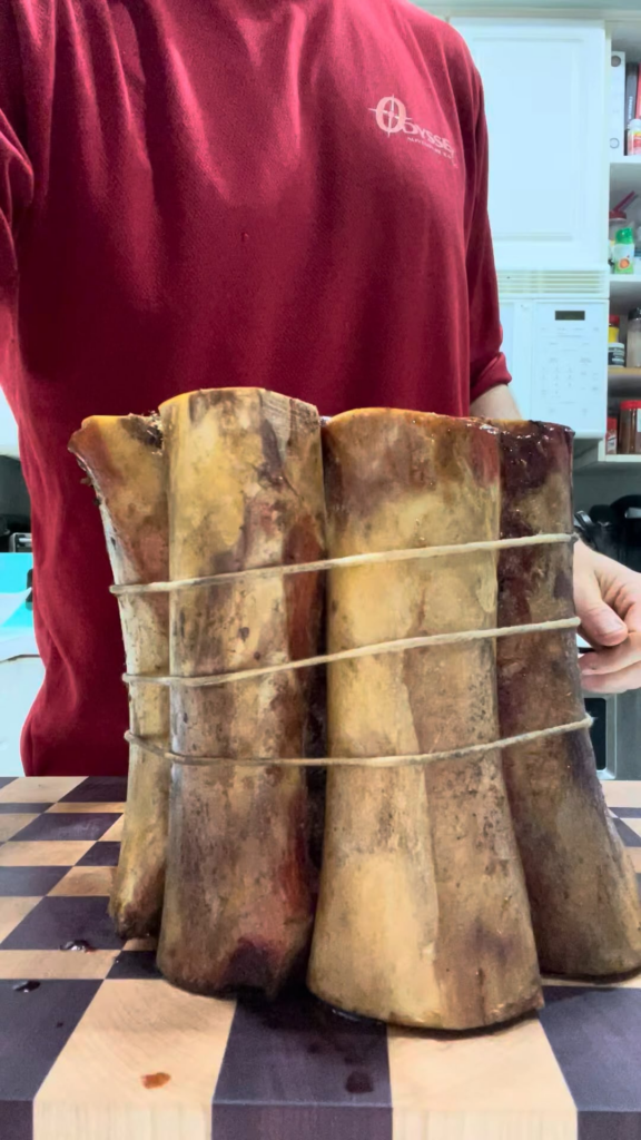 Prime Rib wrapped in Marrow bones (Shotgun Rib Roast)