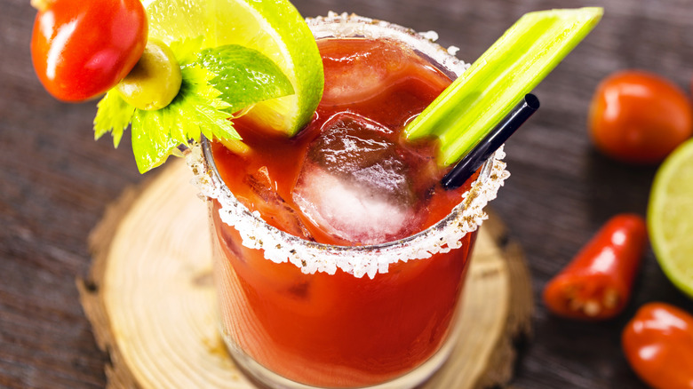 Bloody Caesar cocktail with garnishes