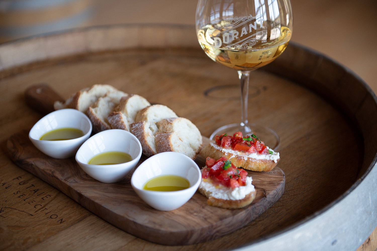 Wine, olive oil, and bruschetta during the Olio Nuovo Festival at Durant. 