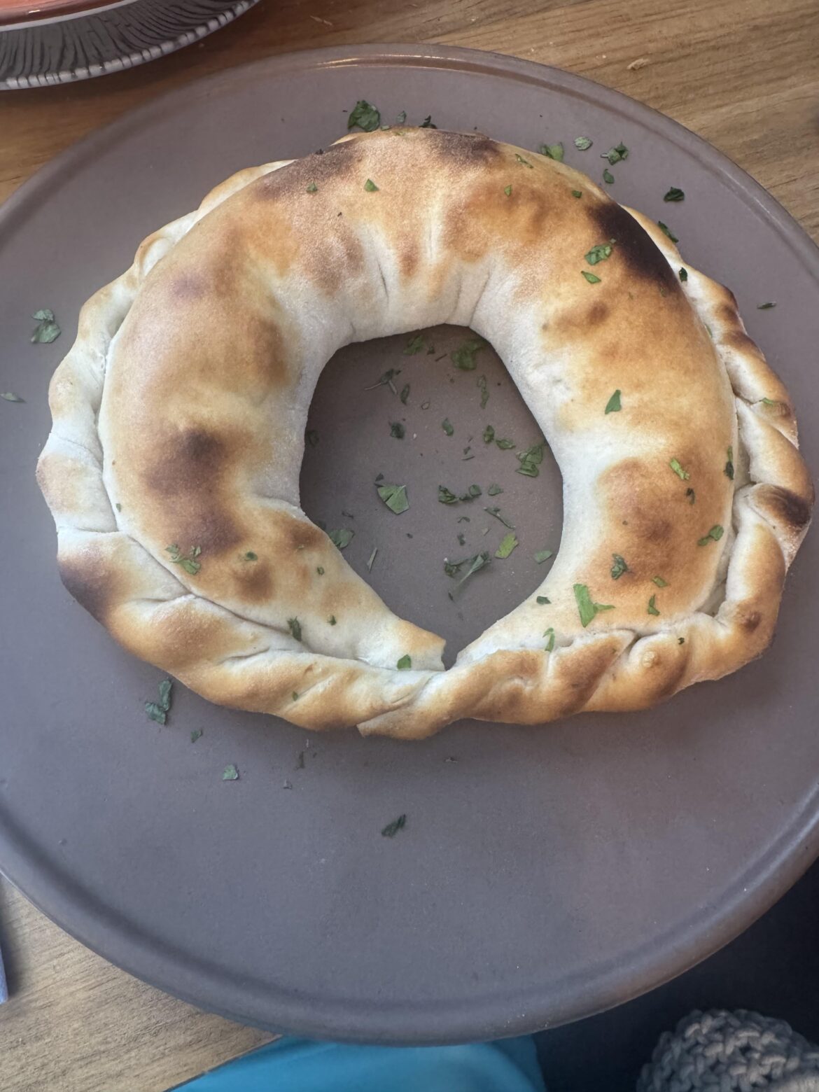 Ring-shaped calzone I tried today — still counts as pizza, right? 😄