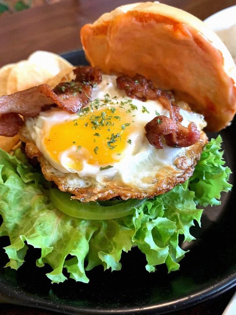 A burger with an egg on top just hits different