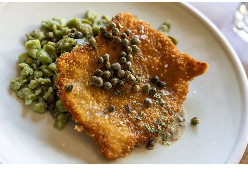  The Pork Schnitzel with spinach spatula and brown butter caper sauce at Le Charme restaurant and bar on Edmonton Trail N.E. was photographed on October 22, 2025.Gavin Young/Postmedia